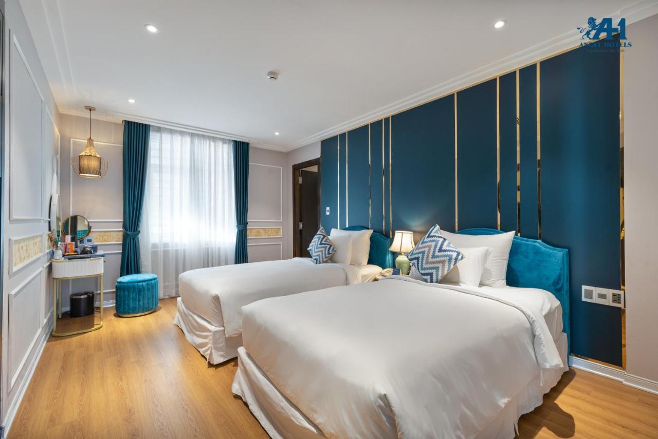 Angel Hotels Beach Danang Extérieur photo